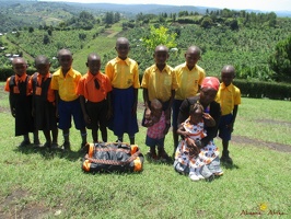 Group photo of needy children with a needy packet from Antina (23)
