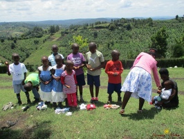 Group photo of needy children with a needy packet from Antina (10)