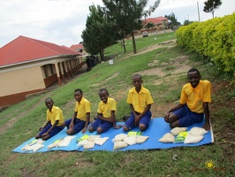 p.5 group photo of children with their food package (2)