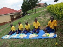p.5 group photo of children with their food package (3)