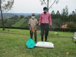 Murungi Ronald's family with their food package (1)