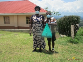 Kwesiga Pauls family with their seeds (1)