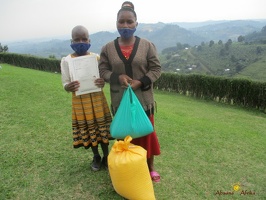 Nyakato Josephines family with their food relief (1)