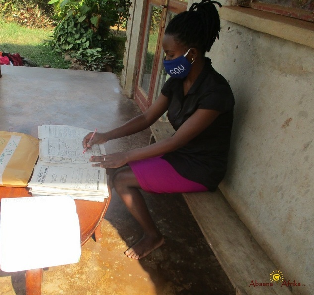 Teacher Mawino Caroline marknig home study work (8).JPG
